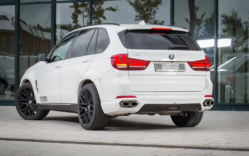 white bmw suv rear view