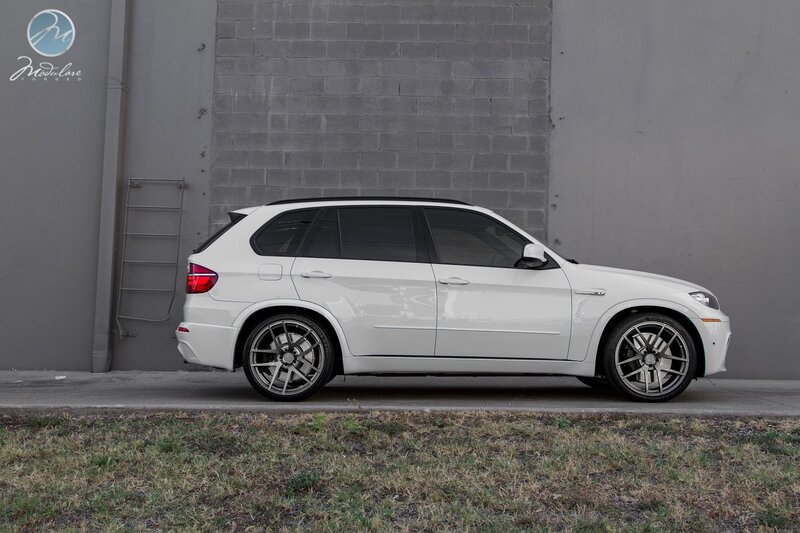white bmw suv side view