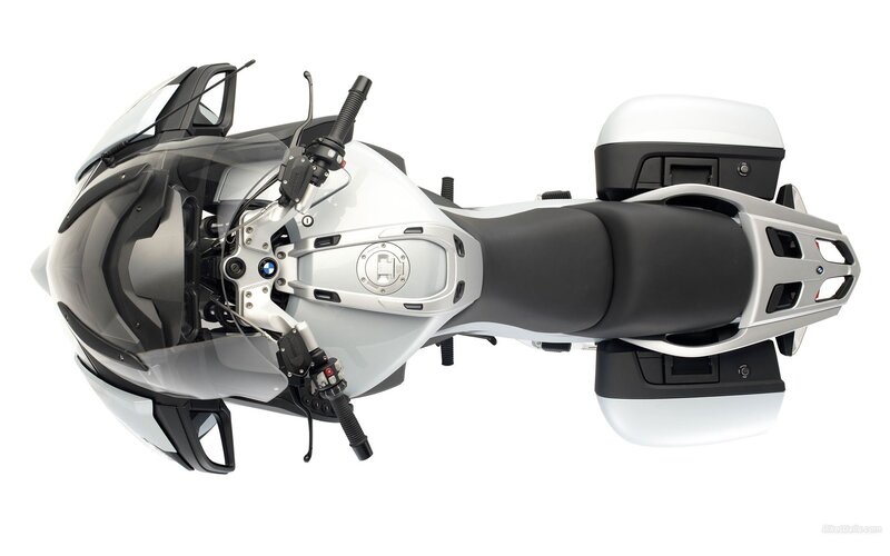 white BMW touring motorcycle