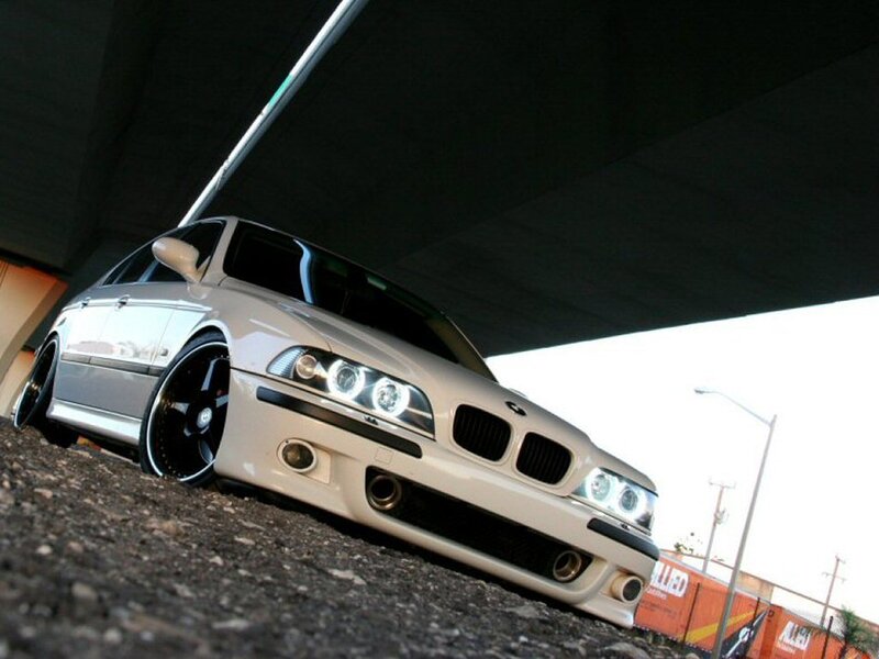 white bmw under overpass