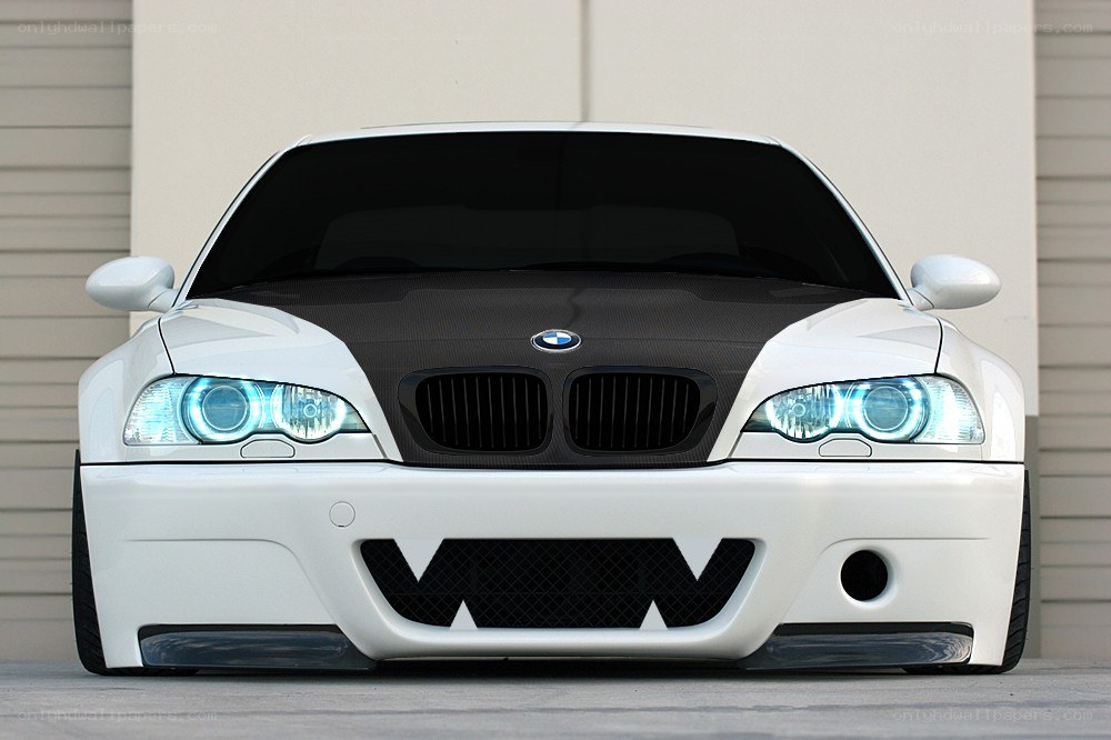 white bmw with blue headlights