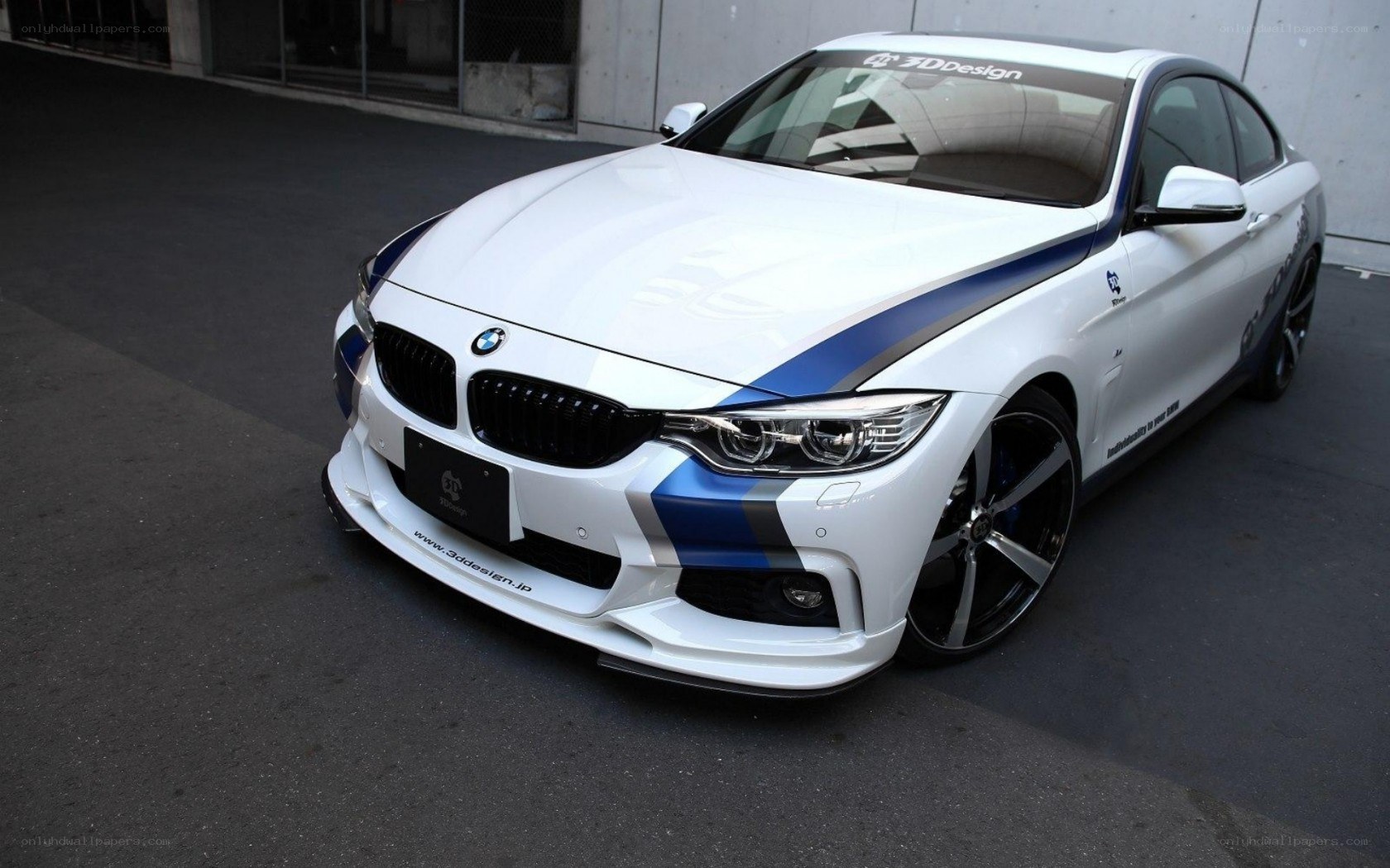 White BMW with blue stripes