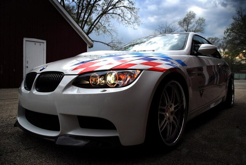 white bmw with checkered stripes
