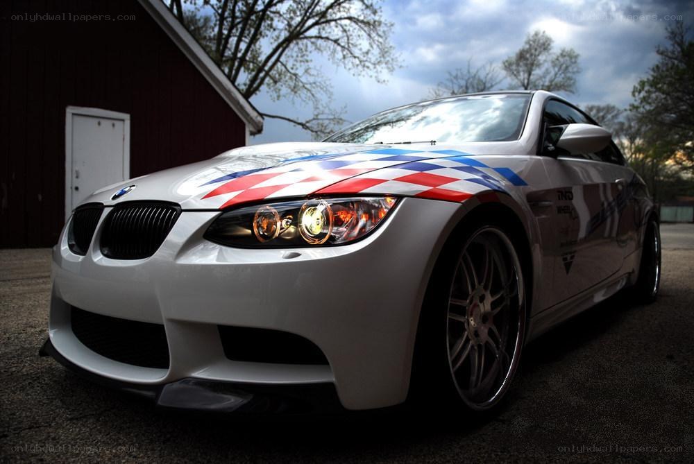 white bmw with checkered stripes