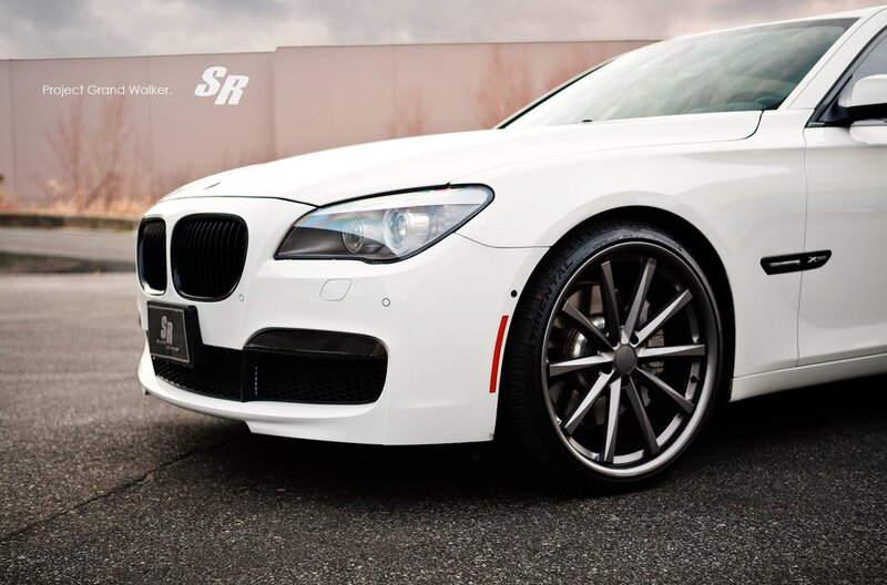 white bmw with custom wheels
