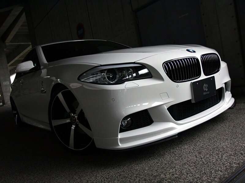 white bmw with custom wheels