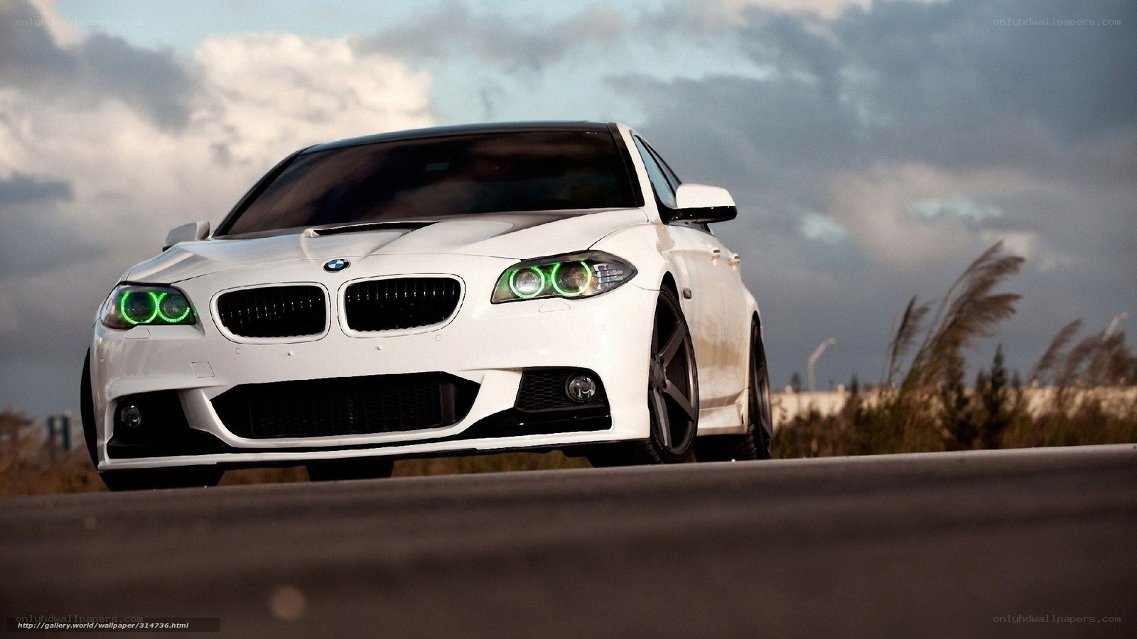 white bmw with green headlights