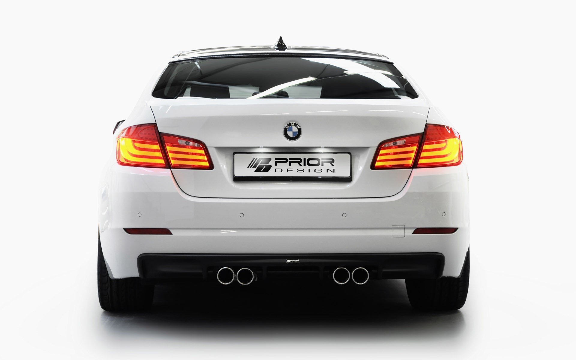 white bmw with prior design badge