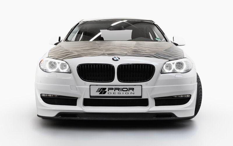 white bmw with prior design front