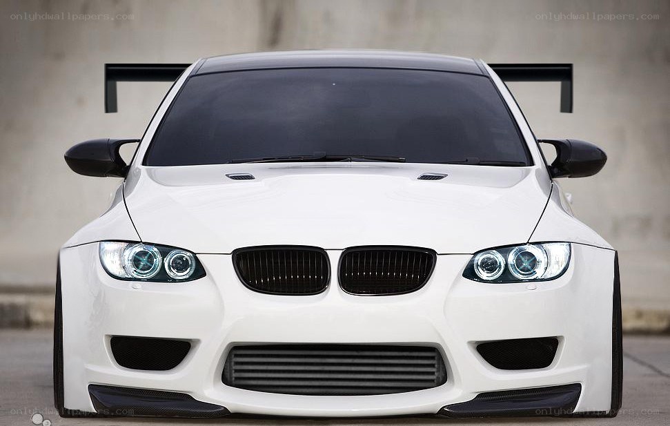 white bmw with racing modifications