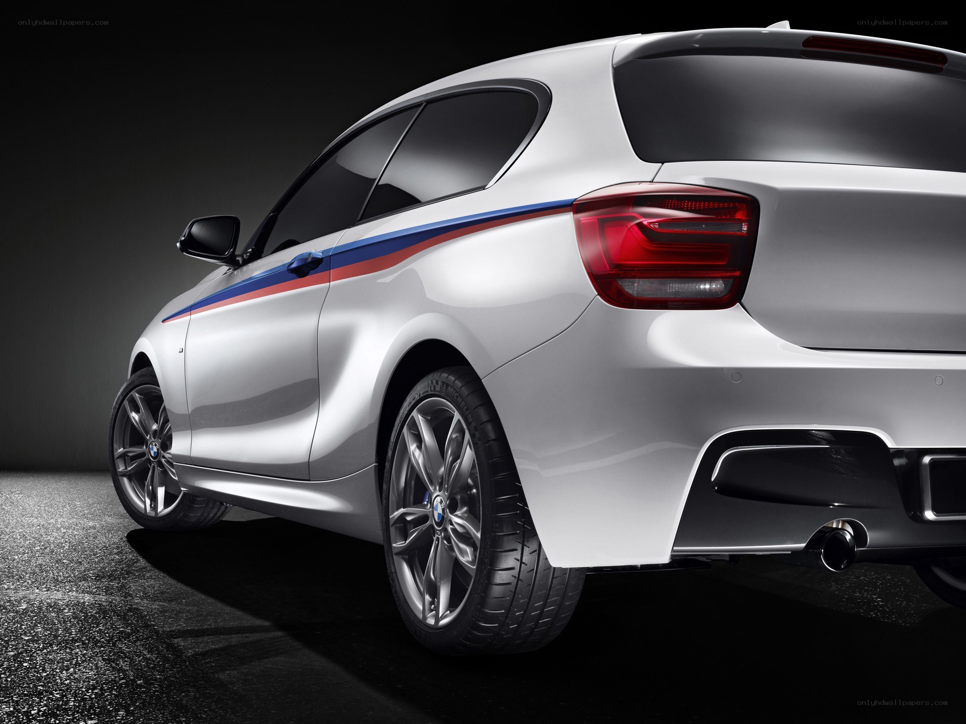 white bmw with racing stripes