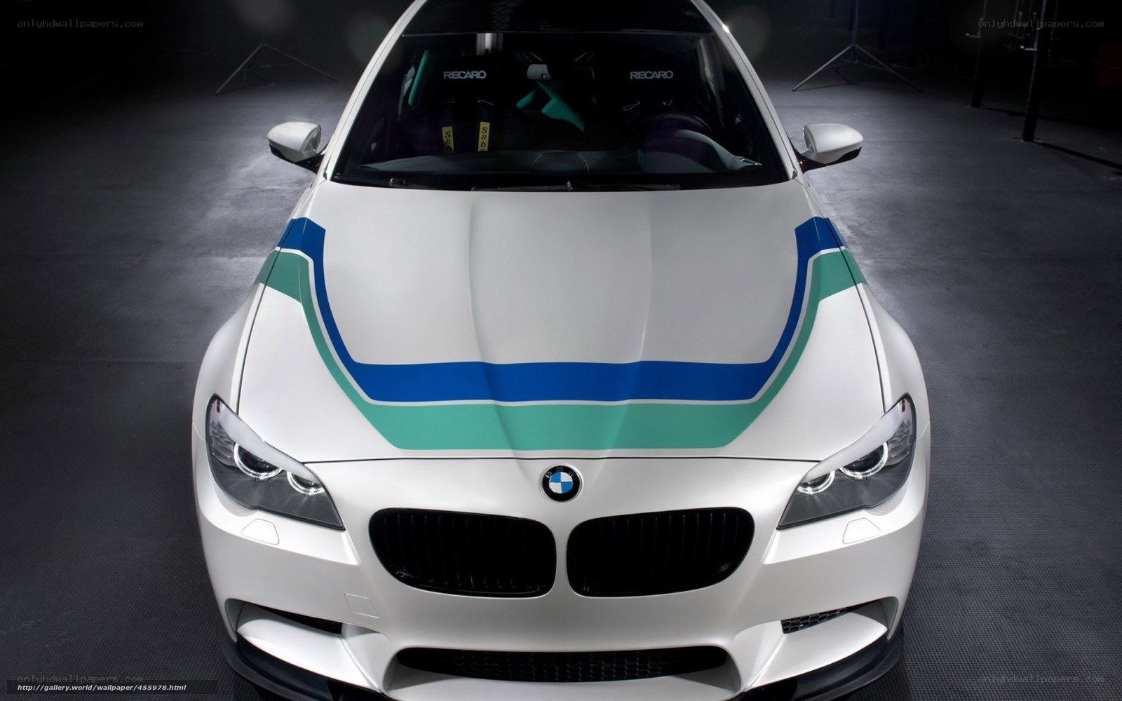 white bmw with racing stripes