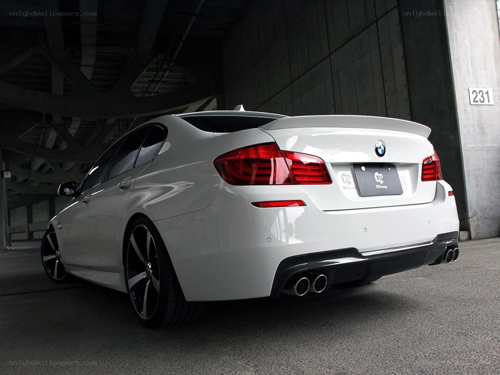 white bmw with rear spoiler