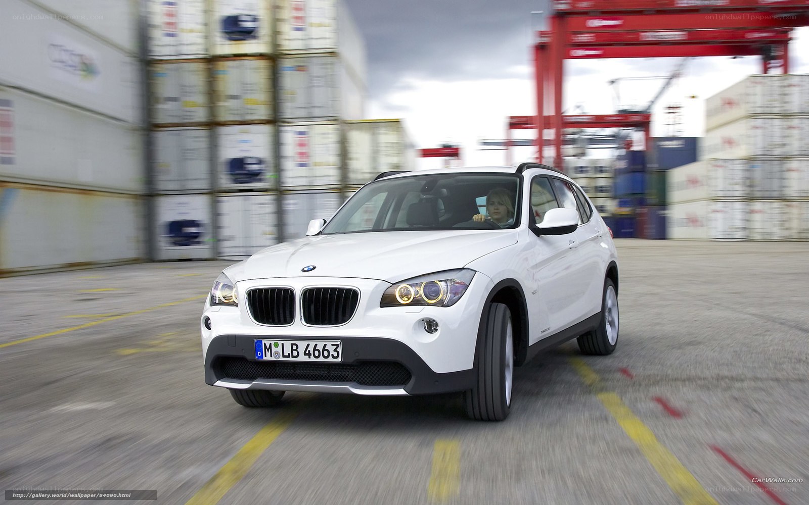 White BMW X1 in port