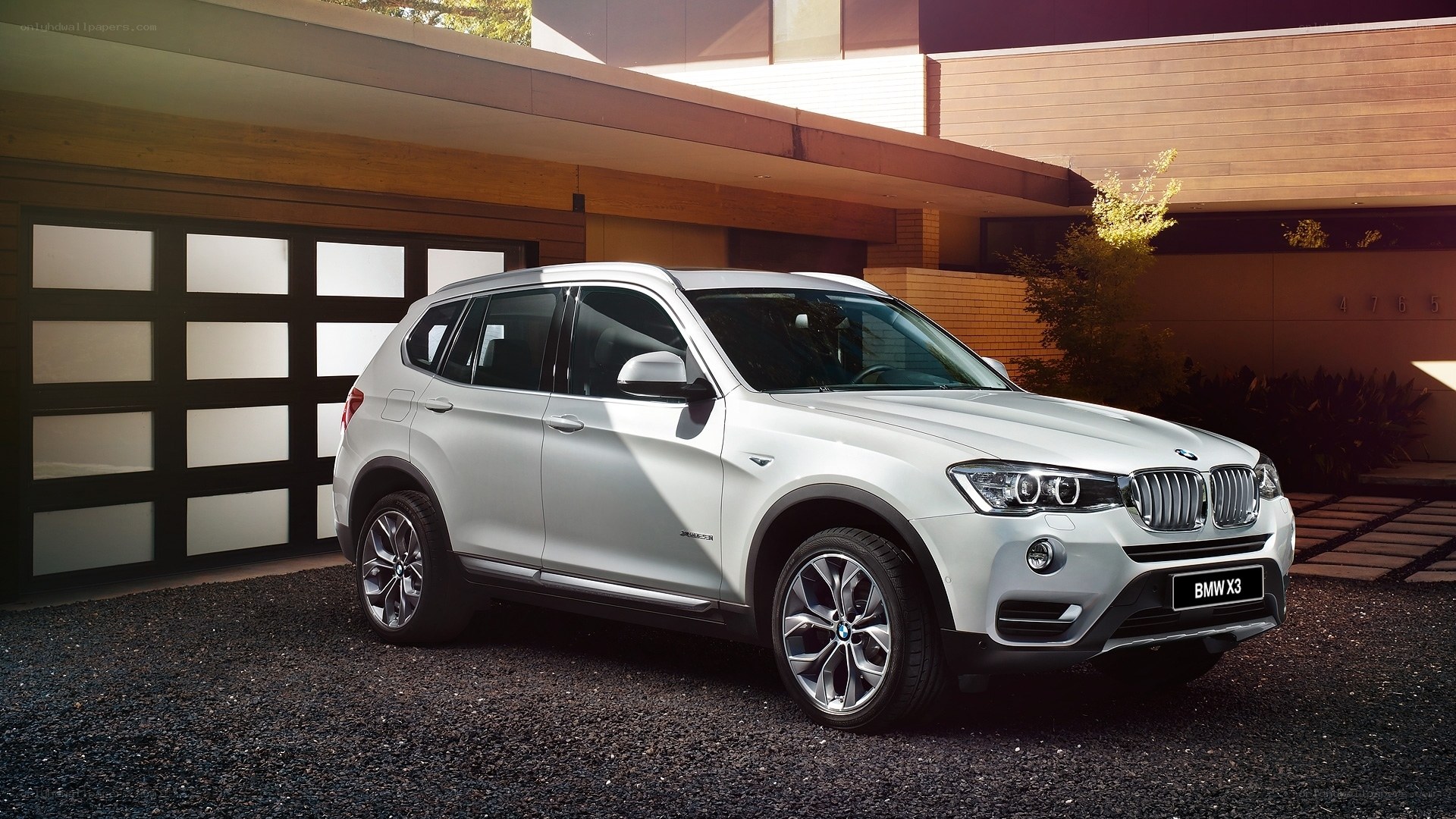 White BMW X3 SUV parked