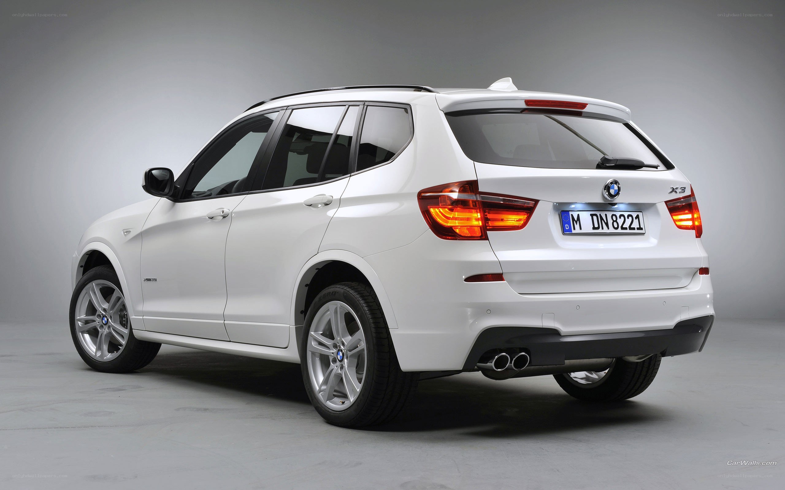 white bmw x3 suv rear view