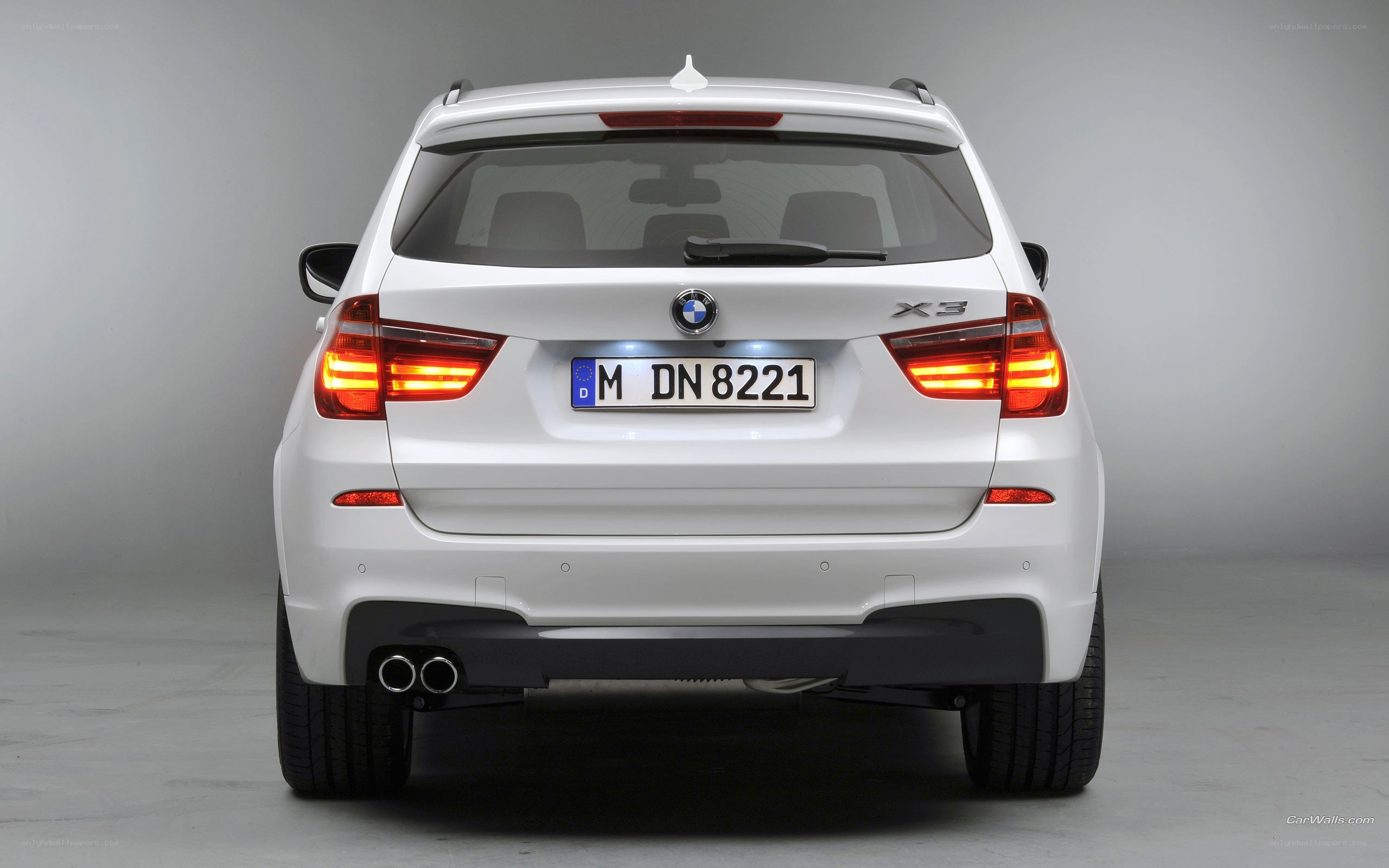 white bmw x3 suv rear view