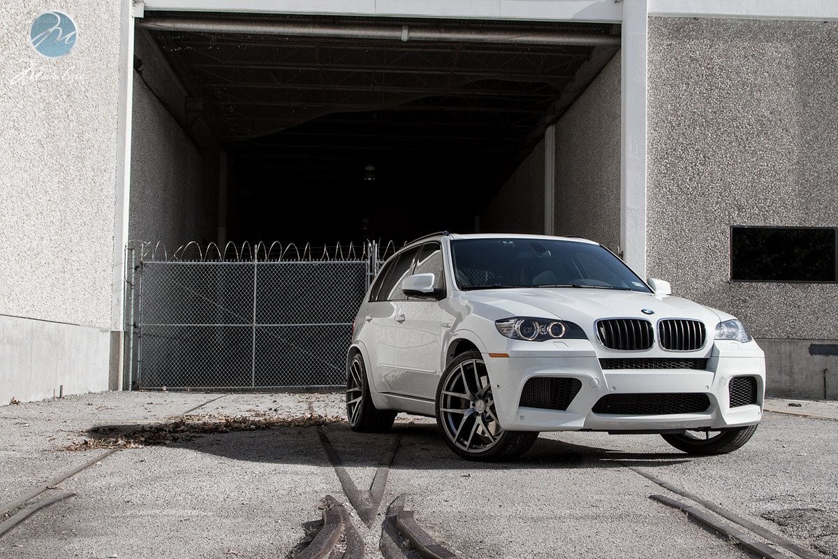 White BMW X5 M parked outside