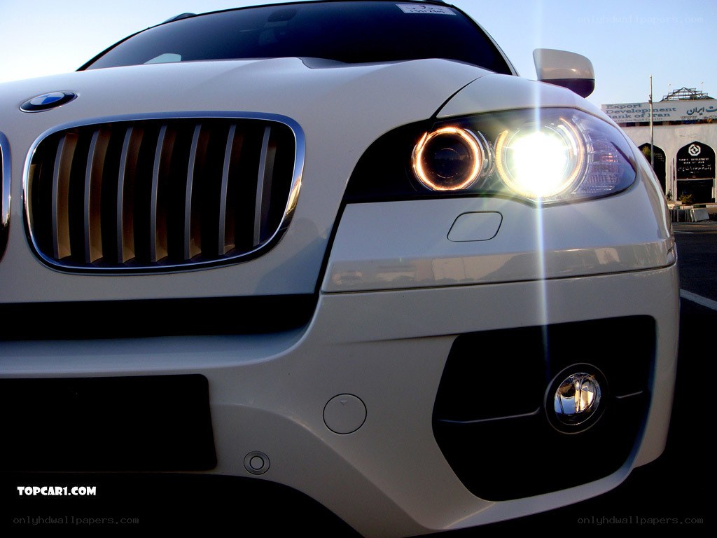 White BMW X6 front view