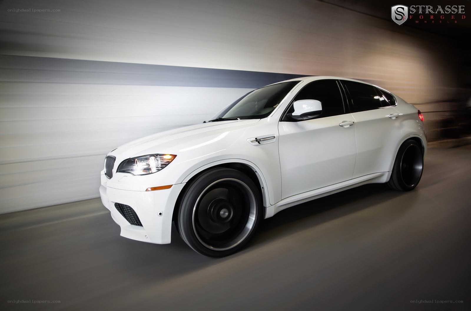 white bmw x6 in motion