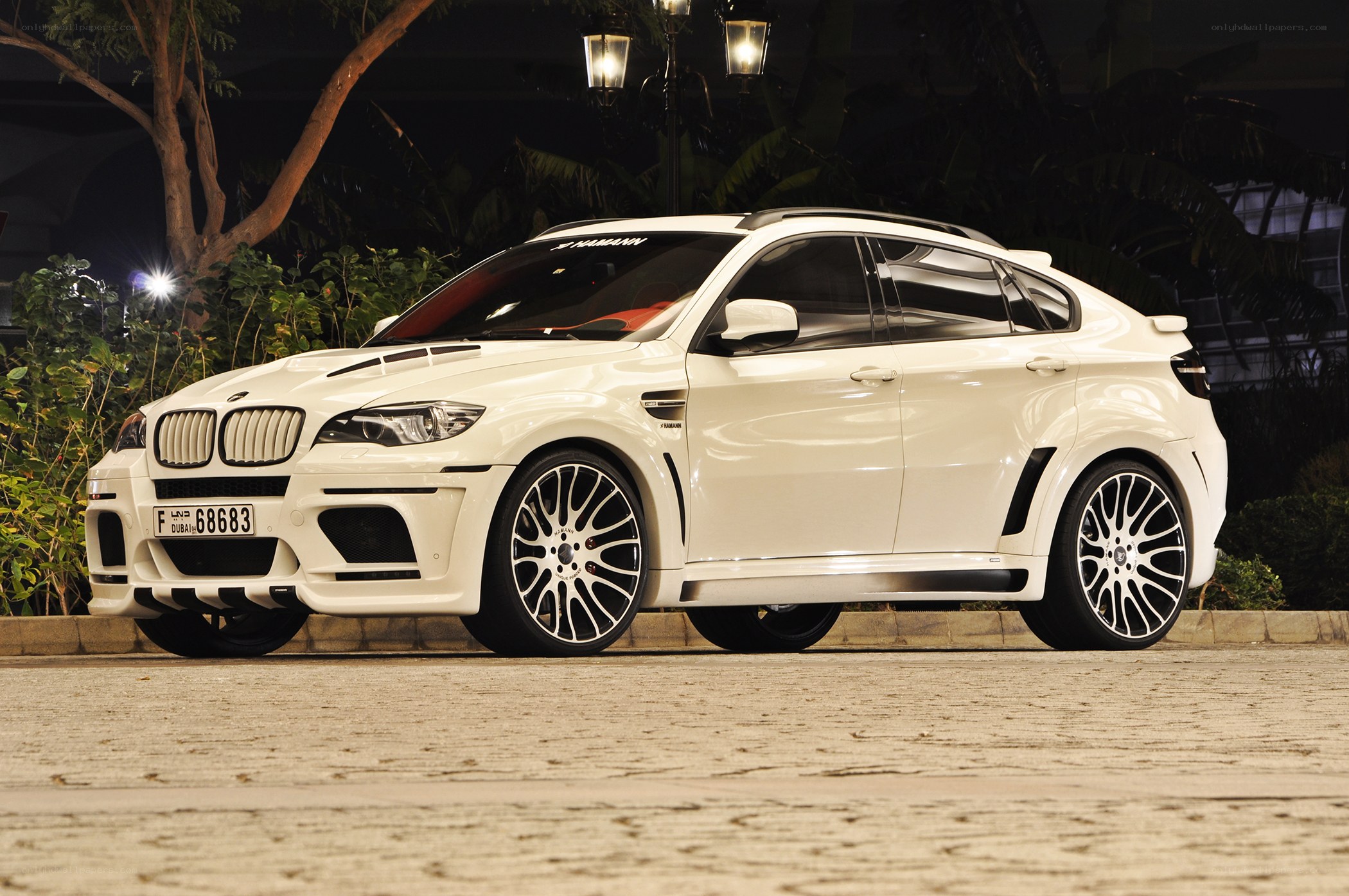 white bmw x6 m at night
