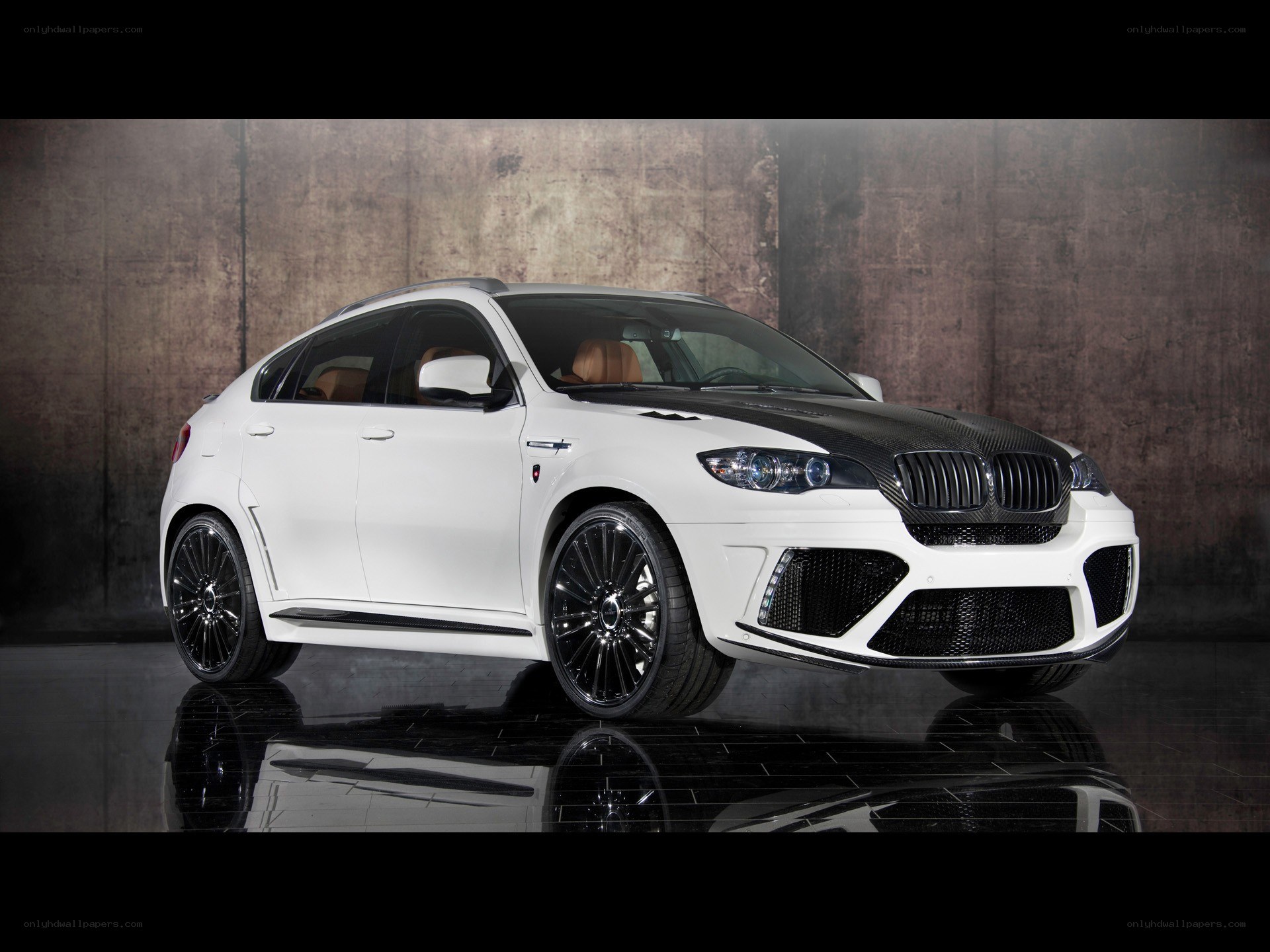 white bmw x6 m performance