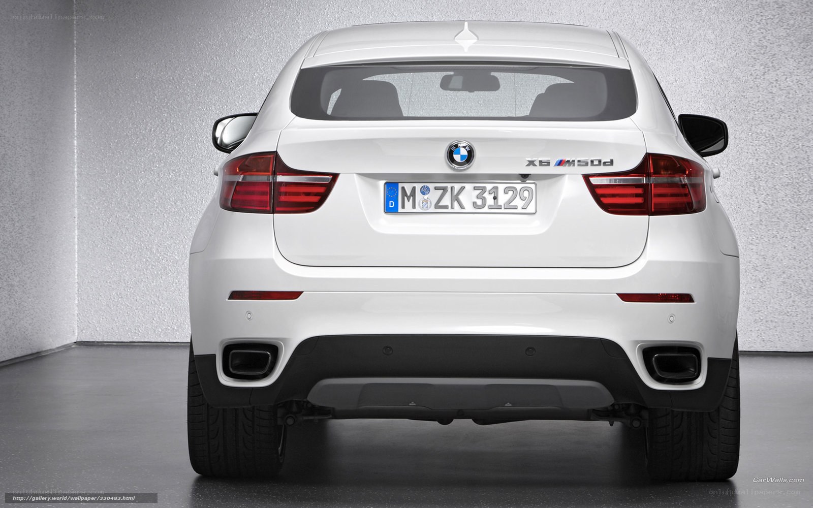 white bmw x6 m50d rear view