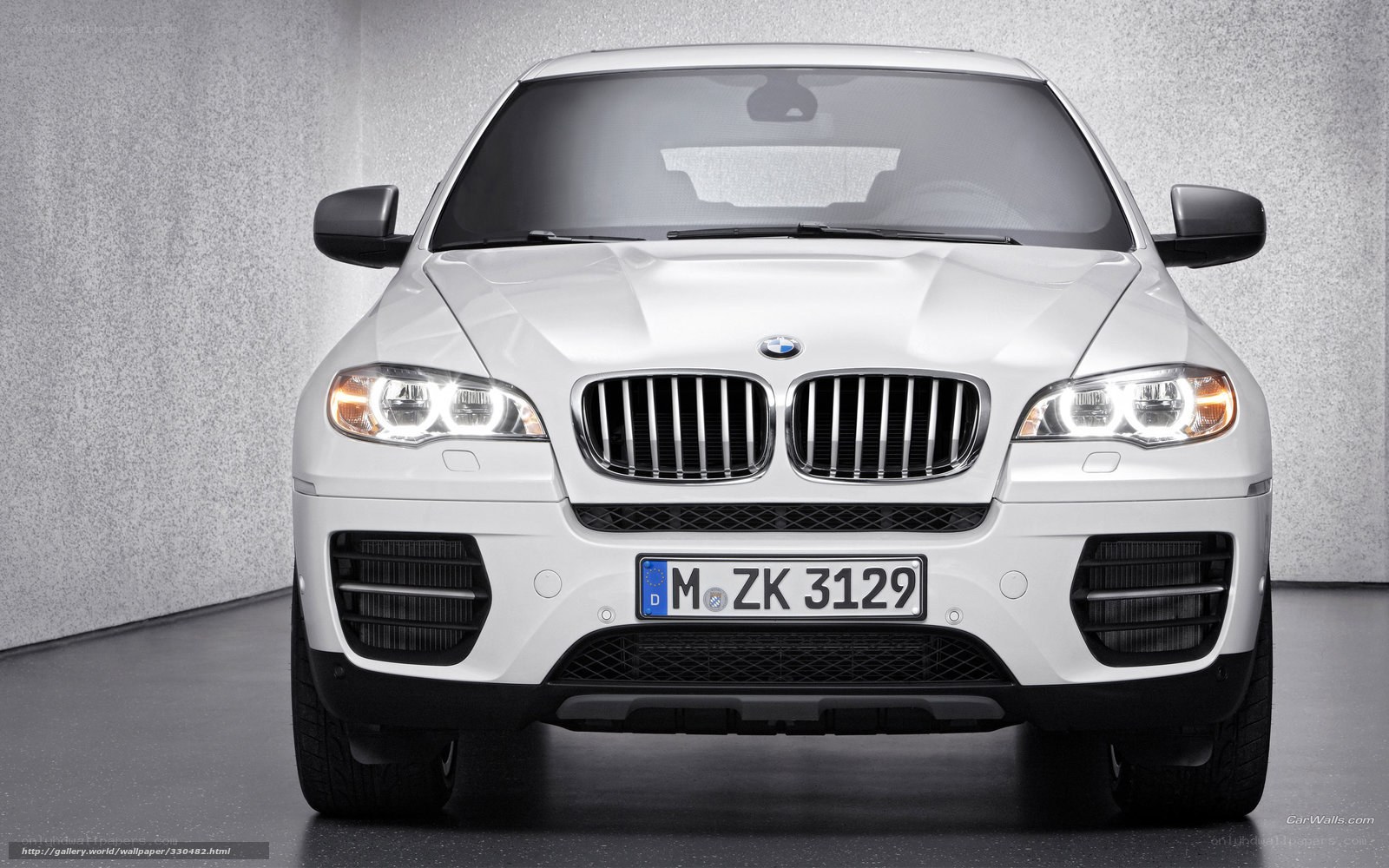 white bmw x6 suv front view