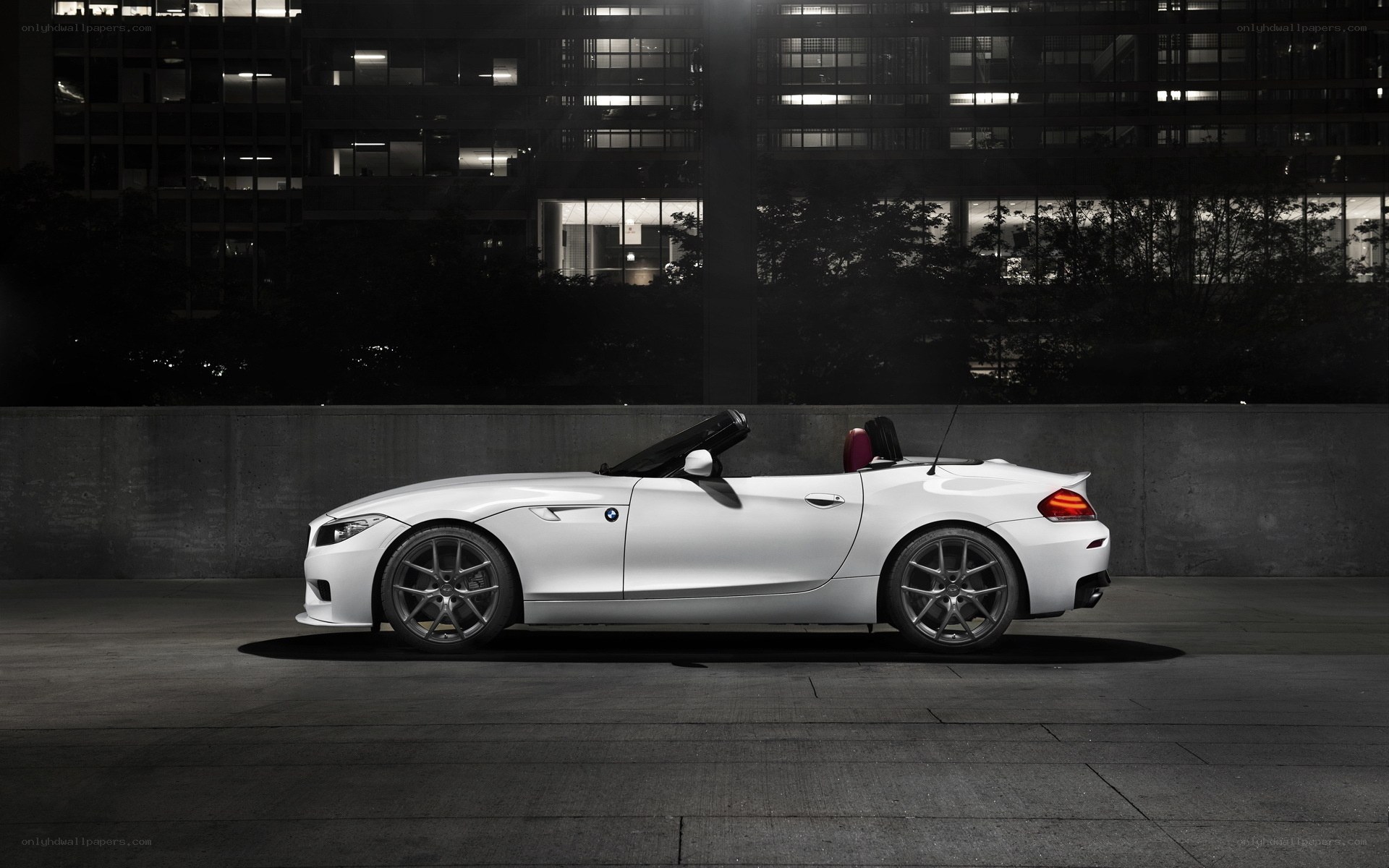 White BMW Z4 convertible at night