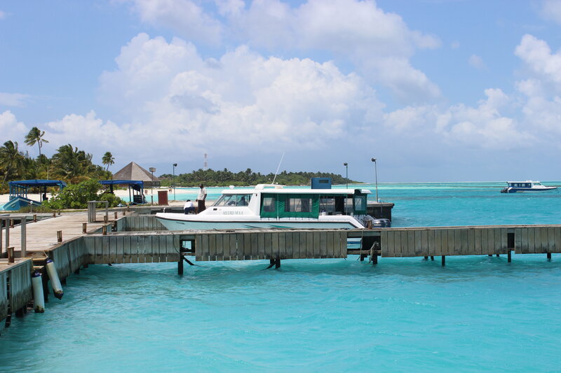 White Boat at Dock — Blue, Serene, Afternoon, Photograph, Island