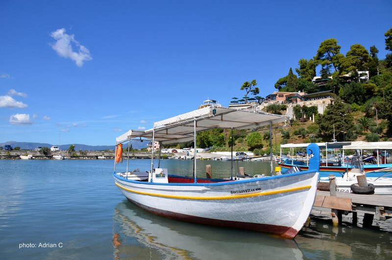 White Boat at Dock — Blue, Serene, Afternoon