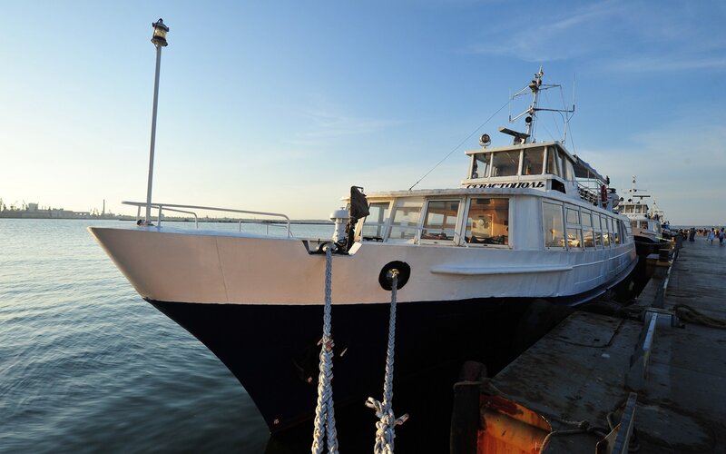 White Boat at Dock — Blue