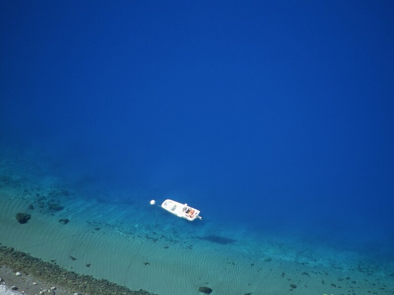 White Boat in Blue Water