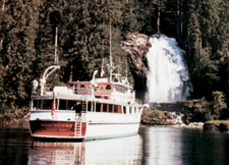 White Boat Near Waterfall