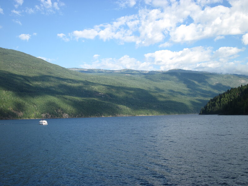 White Boat on Lake — Blue, Serene, Afternoon