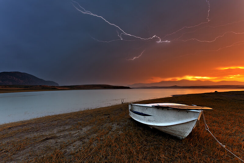 White Boat on Shore — Orange