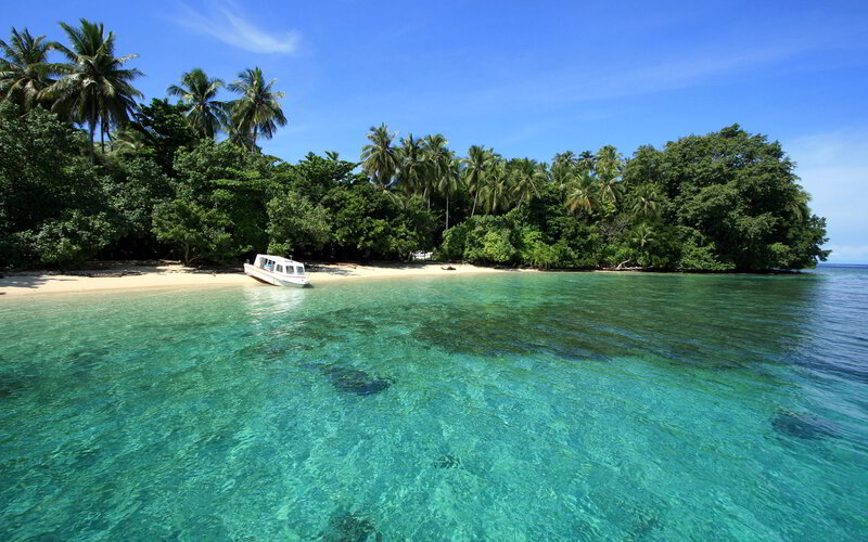 White Boat on Tropical Beach