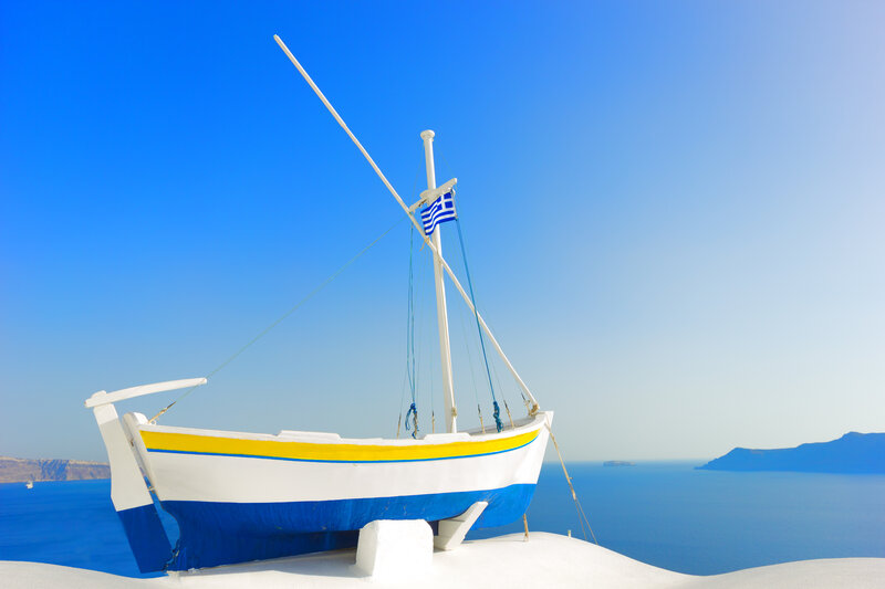 White Boat with Greek Flag