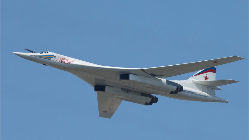 White bomber aircraft in flight