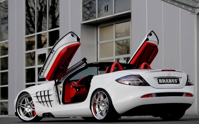 White Brabus sports car with open doors