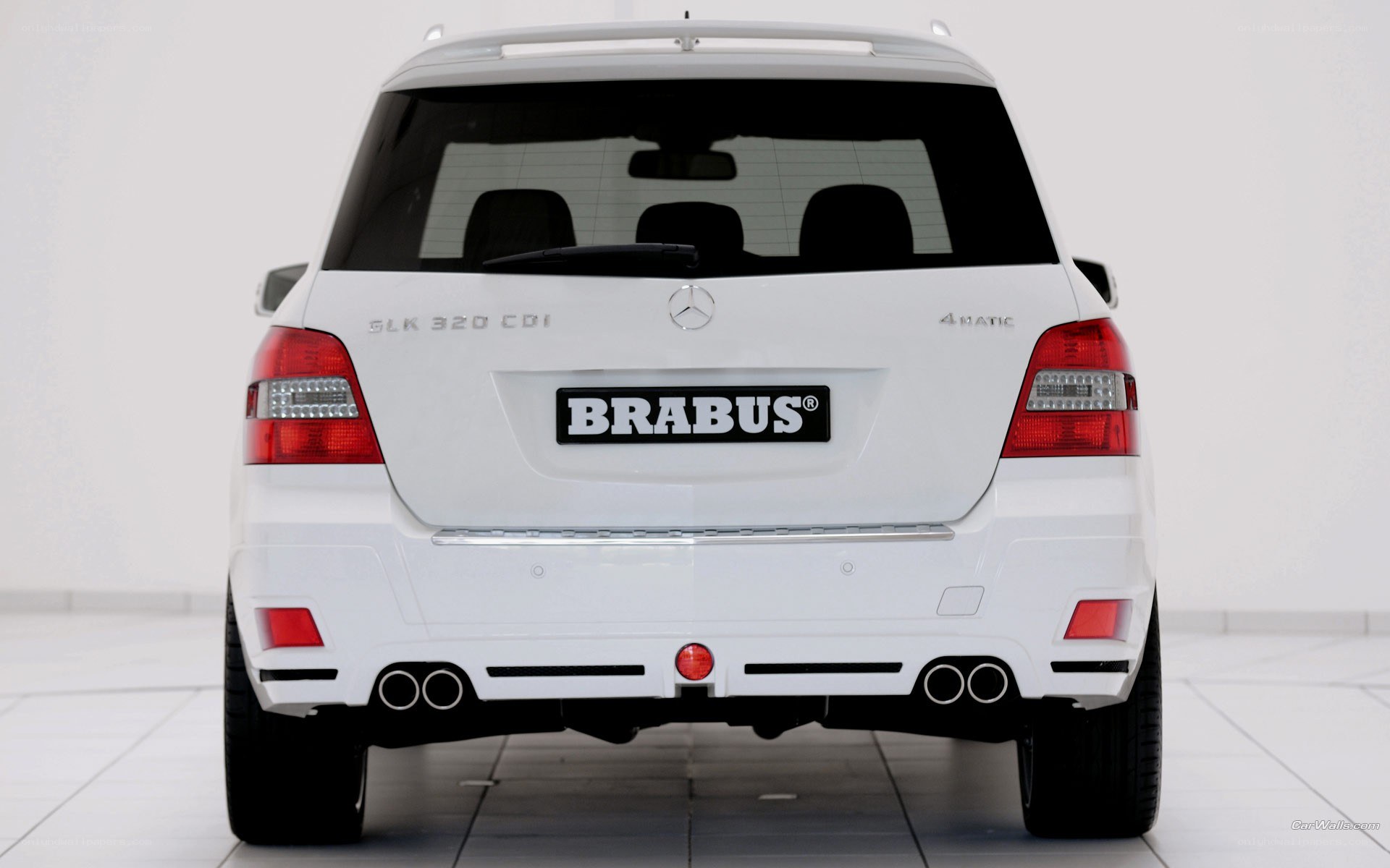 white brabus suv rear view