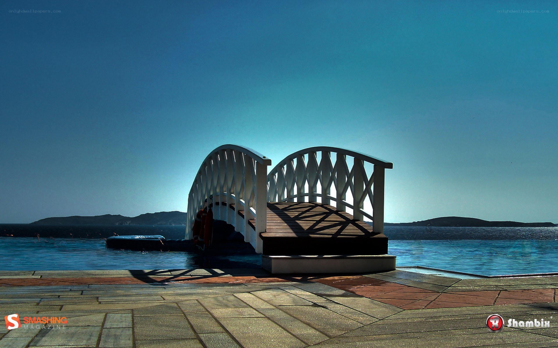 White bridge over infinity pool