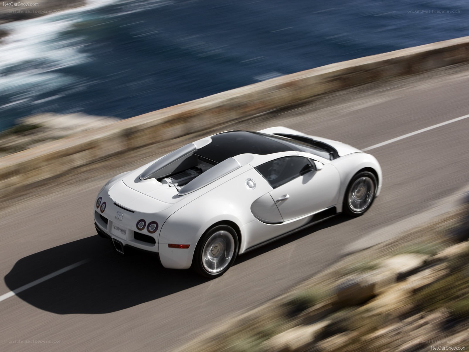 White Bugatti Grand Sport driving