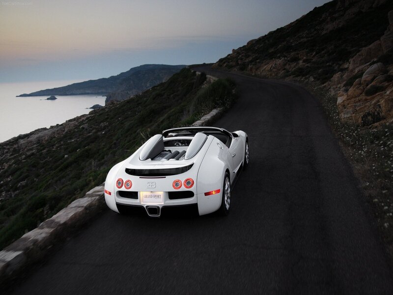 White Bugatti Grand Sport on coastal road