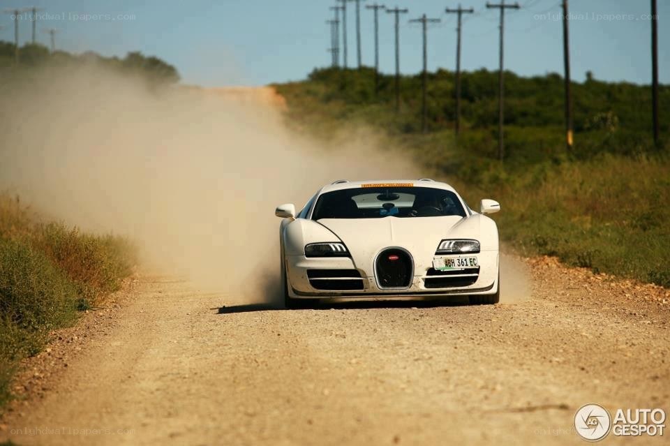white bugatti on dirt road