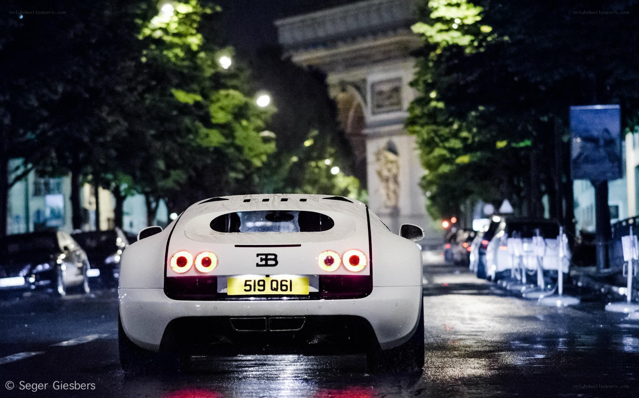 White Bugatti on wet street