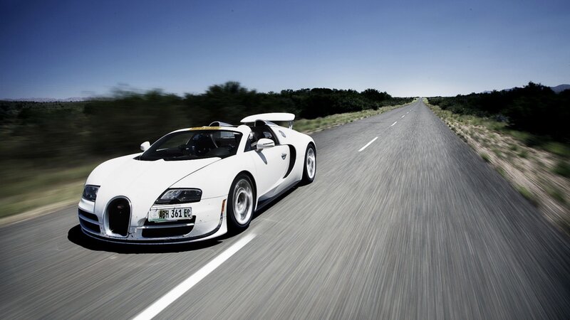 white bugatti speeding on road