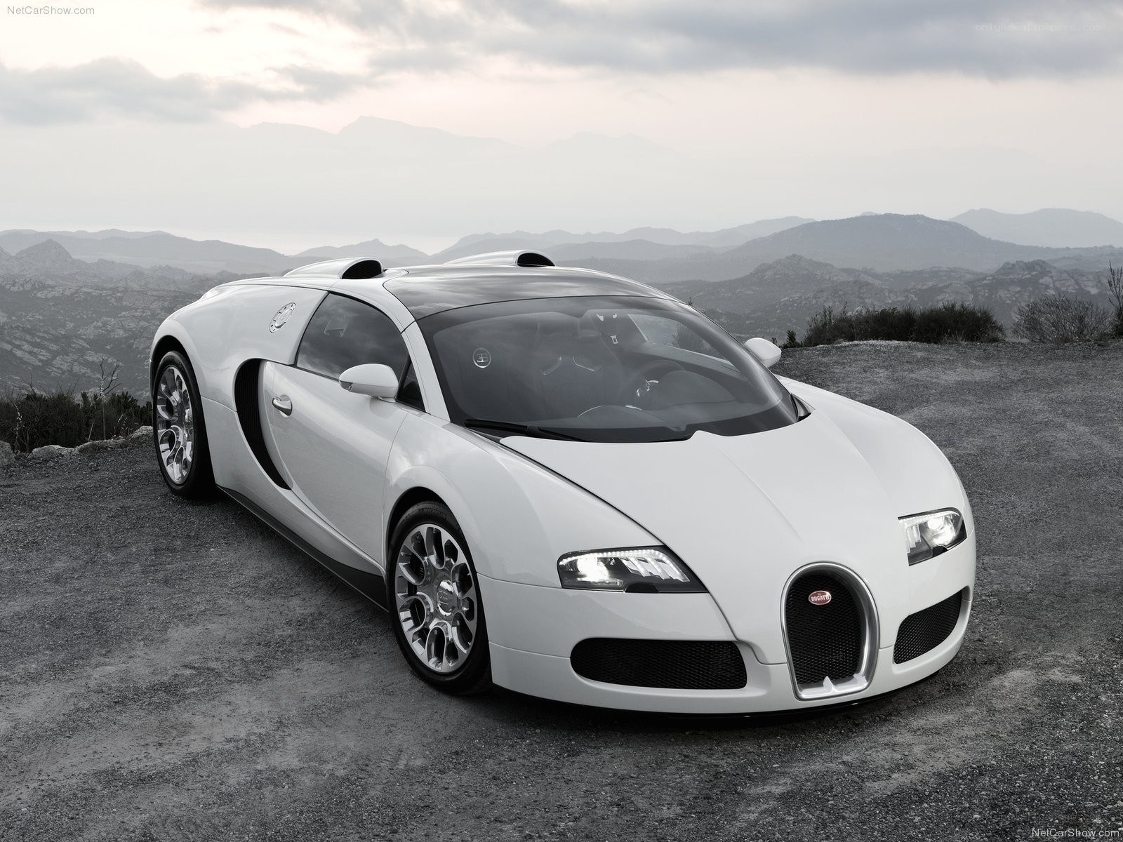 White Bugatti Veyron on a mountain road