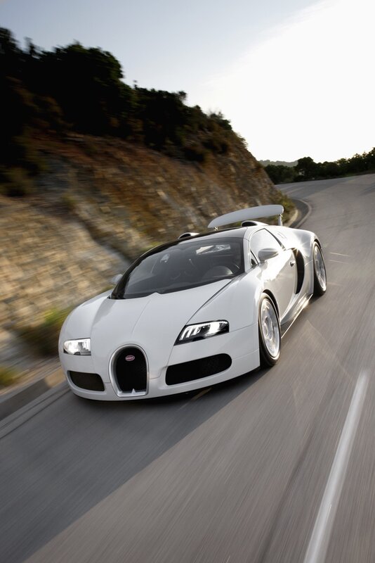 White Bugatti Veyron on a winding road