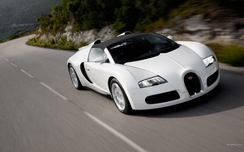 White Bugatti Veyron on a winding road
